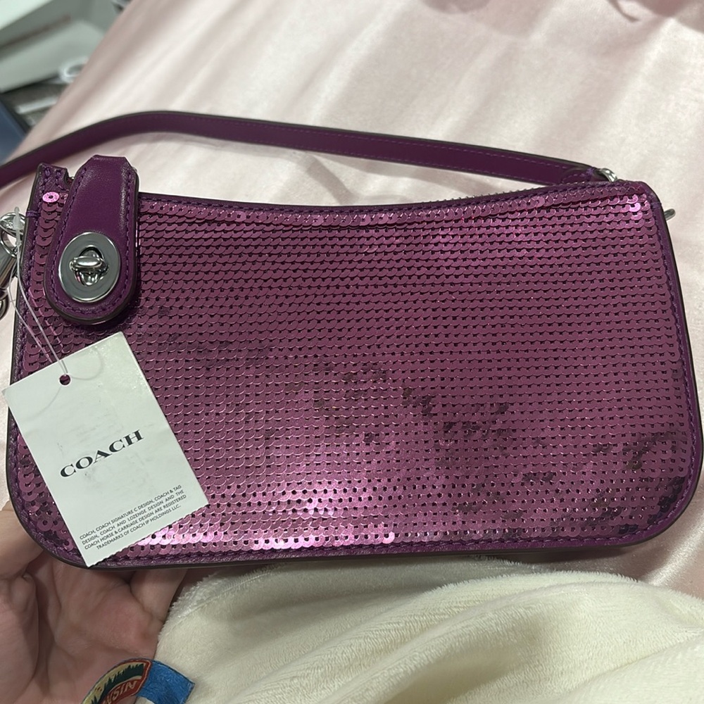 coach sequence lock bag